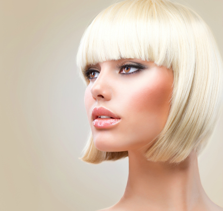 Haircut. Hairstyle. Beautiful Model with short Blond hair