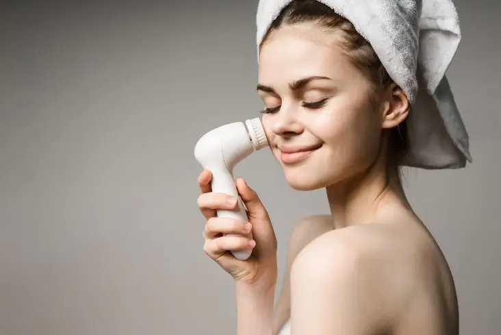 exfoliating with face brushes