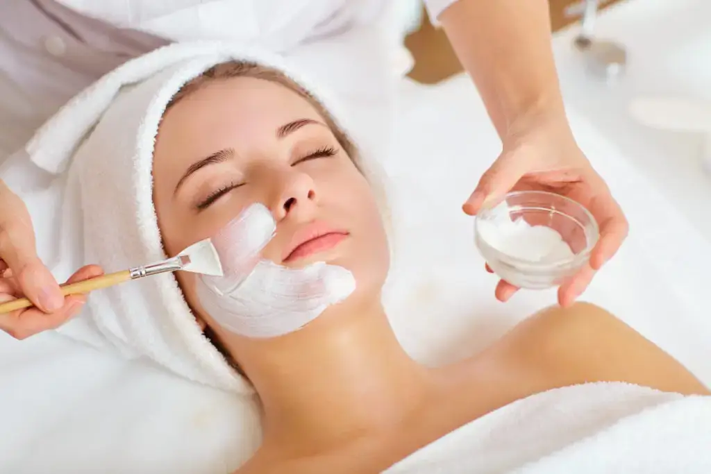 esthetician providing spa treatment