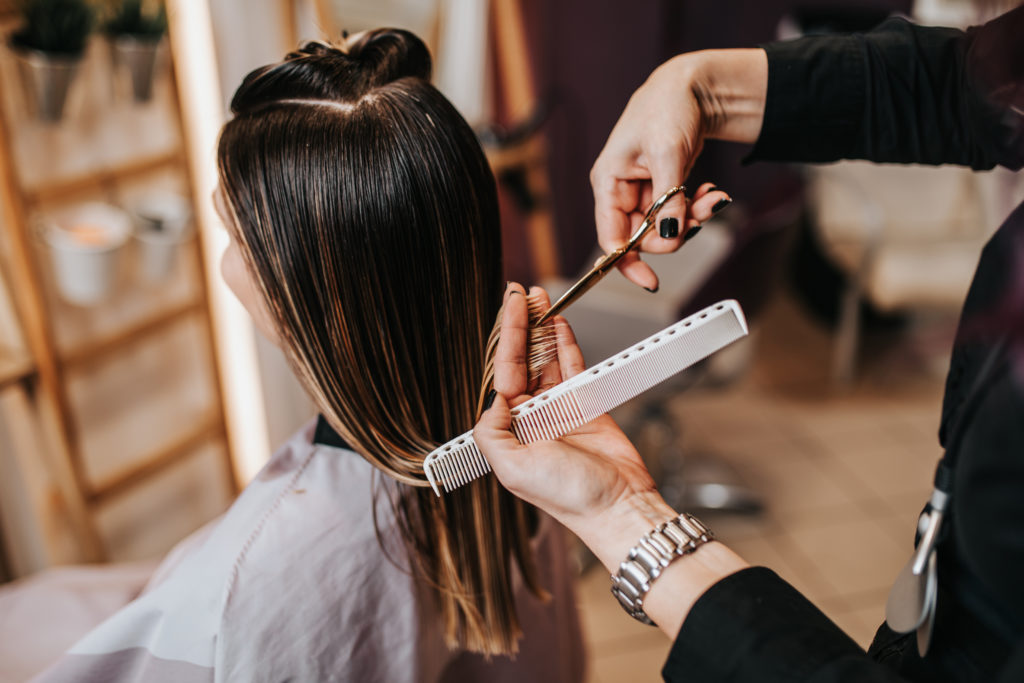 woman getting a haircut