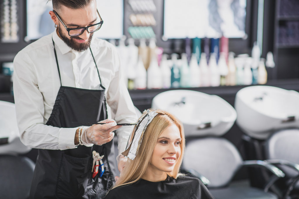 Become a hairstylist and learn to dye hair in a salon.