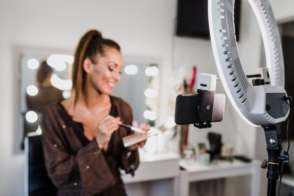 woman in recording makeup Tik Tok video