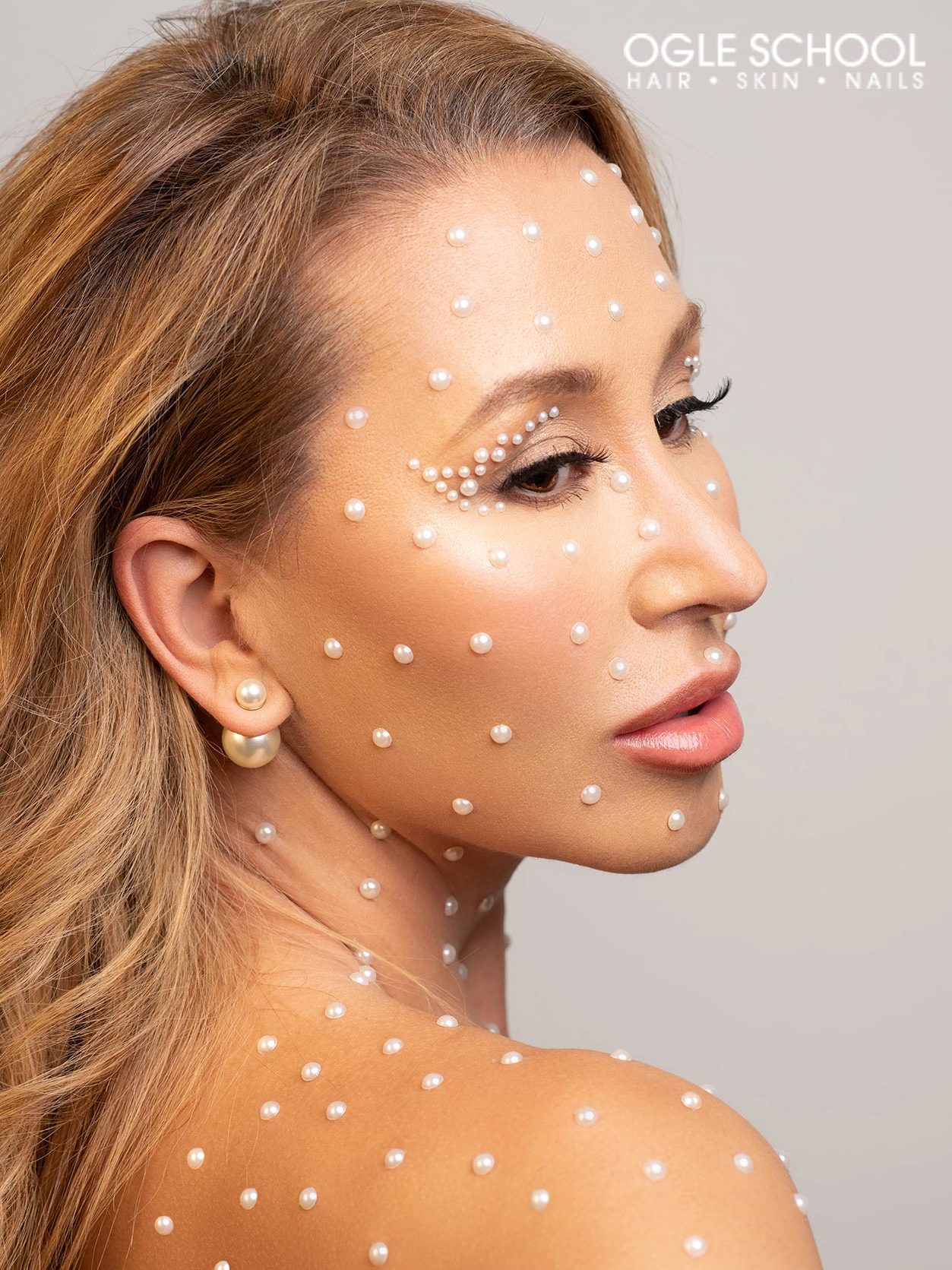 Adhesive pearls face and shoulders