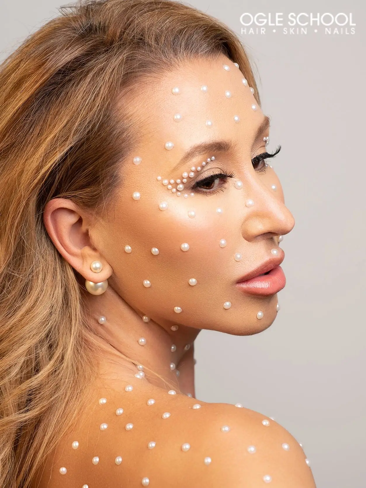 Adhesive pearls face and shoulders