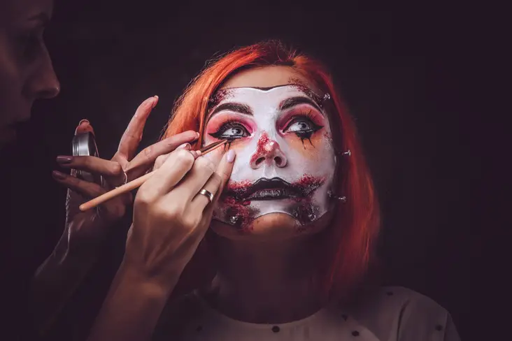 applying costume makeup