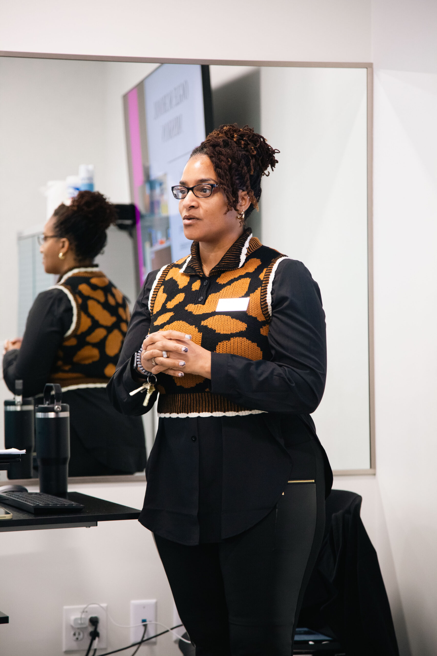 Ogle school instructor teaching the foundations of esthetics
