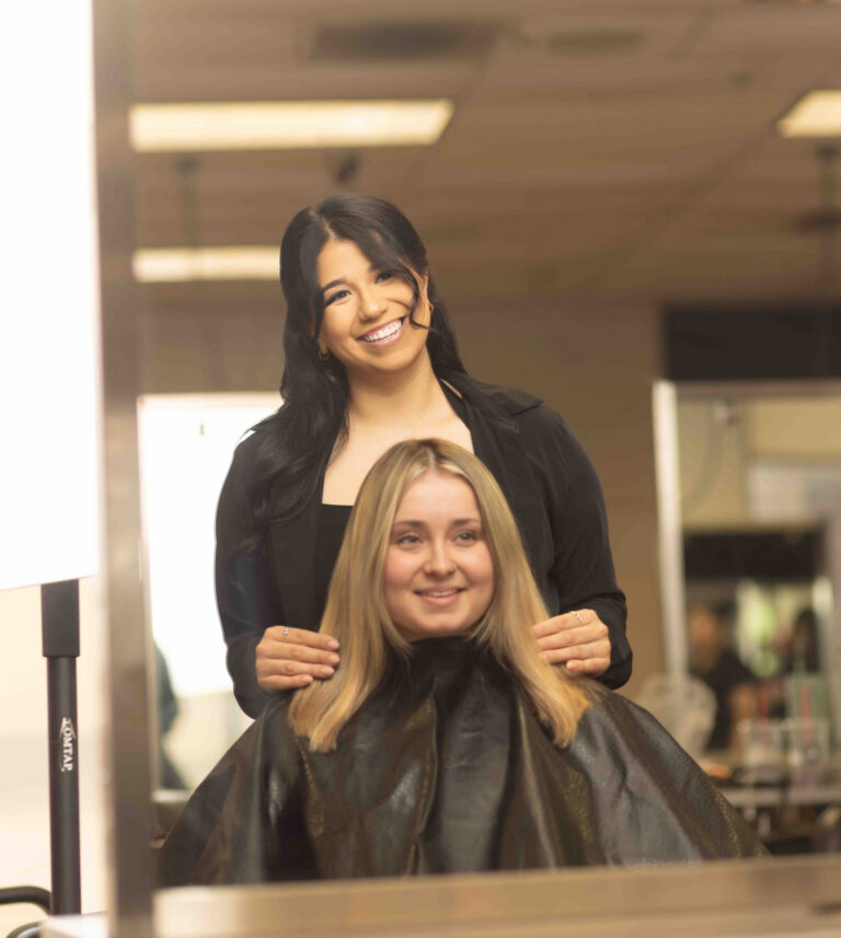 Ogle school student providing hair services to a client
