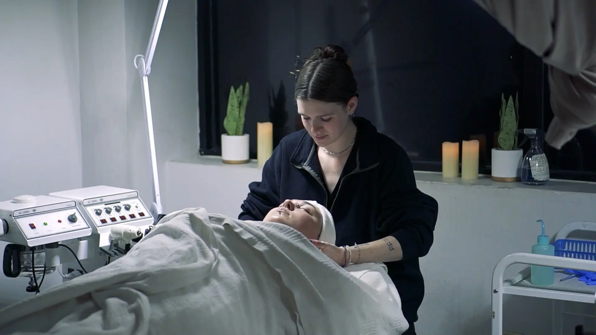 Ogle school esthetician student practicing her facial skills