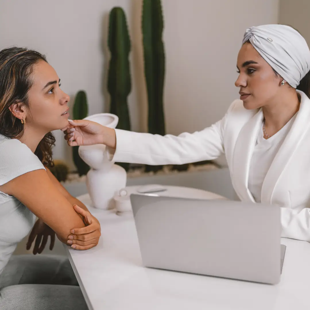 Professional medical esthetician providing service to a client