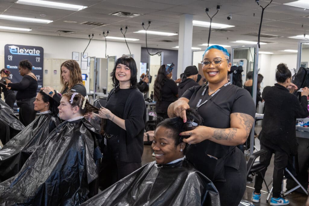 Image of ogle school student and instructor at cosmetology school in Texas