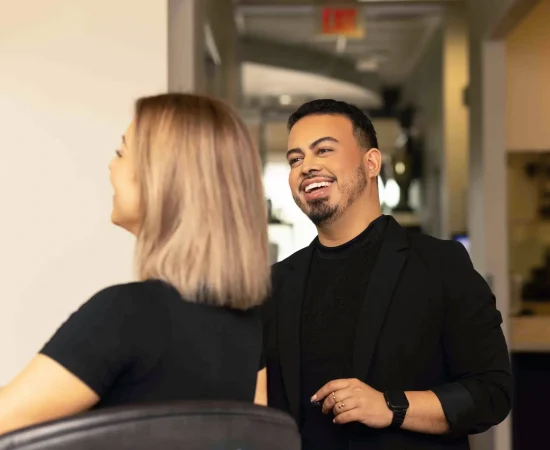Image of an ogle school graduate in his new cosmetology career